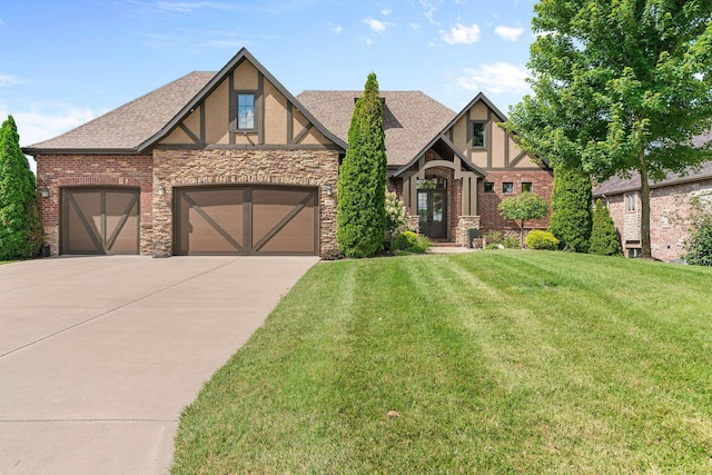 6421 S Valley Brook Ct, Springfield, MO 65810 - tudor home with stucco siding, concrete driveway, a garage, a front yard, and stone siding