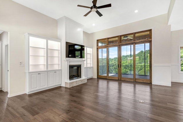564 Marcasite Way, Branson West, MO 65737 - unfurnished living room with ceiling fan, a glass covered fireplace, dark wood-style flooring, and recessed lighting