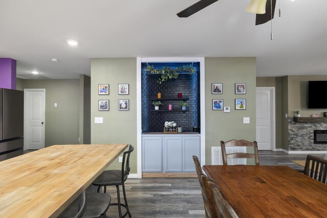 2080 State Route 14, West Plains, MO 65775 - dining room with dark wood-style floors, a ceiling fan, recessed lighting, and bar