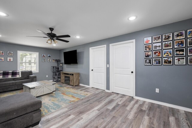 2080 State Route 14, West Plains, MO 65775 - living area with a ceiling fan, wood finished floors, and recessed lighting