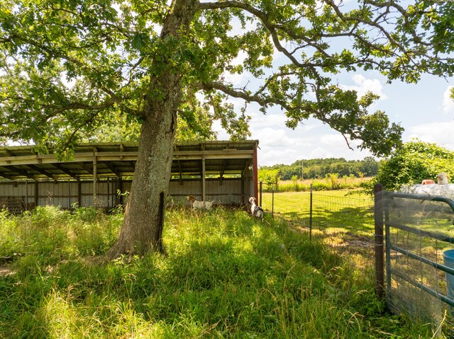 2080 State Route 14, West Plains, MO 65775 - view of yard featuring a pole building and an outbuilding