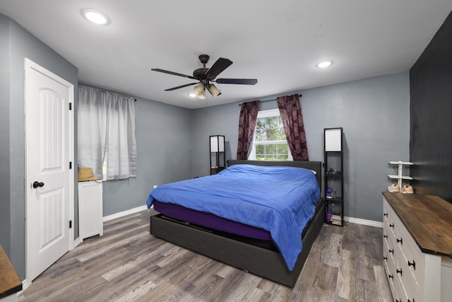 2080 State Route 14, West Plains, MO 65775 - bedroom with wood finished floors, recessed lighting, and ceiling fan