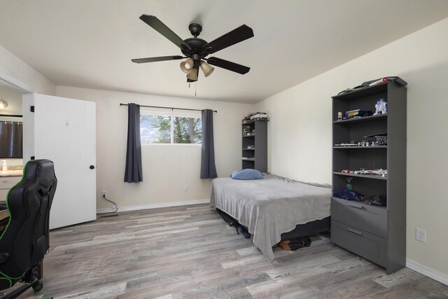 2080 State Route 14, West Plains, MO 65775 - bedroom featuring wood finished floors and a ceiling fan
