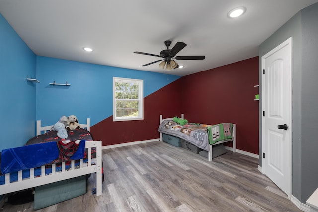 2080 State Route 14, West Plains, MO 65775 - bedroom with wood finished floors, a ceiling fan, and recessed lighting