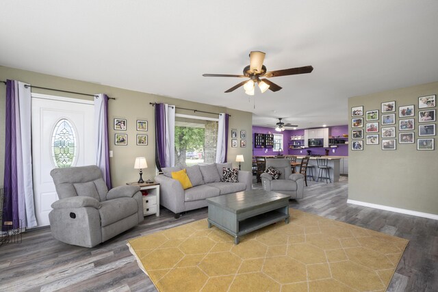 2080 State Route 14, West Plains, MO 65775 - living area featuring a ceiling fan and wood finished floors