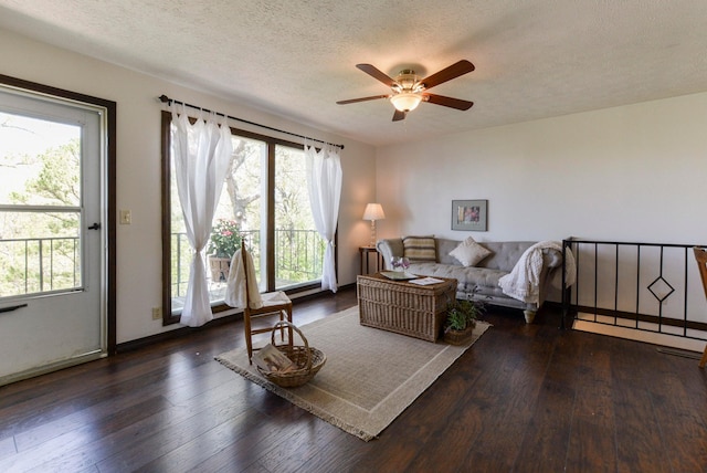 9755 State Highway 13, Kimberling City, MO 65686 - living room with plenty of natural light, a ceiling fan, a textured ceiling, and hardwood / wood-style floors