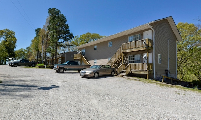9755 State Highway 13, Kimberling City, MO 65686 - view of front of property with stairway and uncovered parking