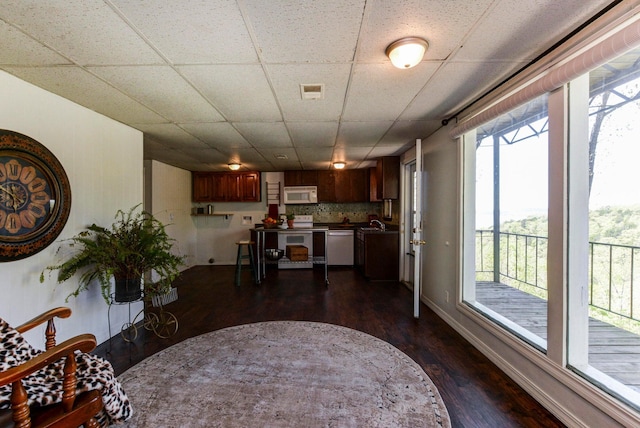 9755 State Highway 13, Kimberling City, MO 65686 - dining room featuring a drop ceiling and dark wood-style floors