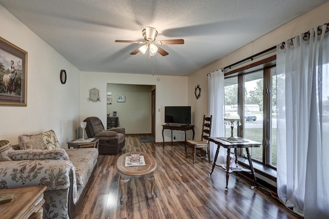 2148 Carrie St, Carthage, MO 64836 - living area with ceiling fan, wood finished floors, and a textured ceiling