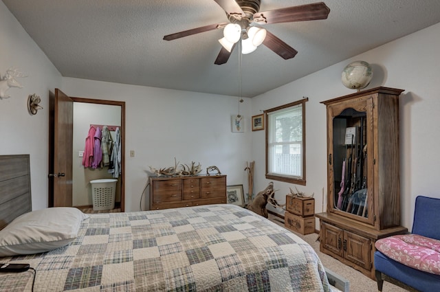 2148 Carrie St, Carthage, MO 64836 - carpeted bedroom featuring a textured ceiling and ceiling fan