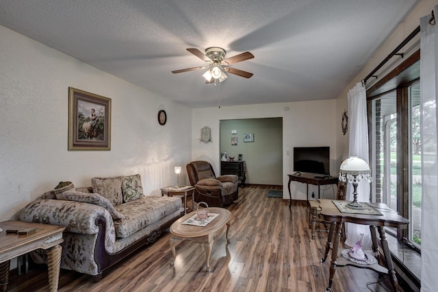 2148 Carrie St, Carthage, MO 64836 - living area with ceiling fan and wood finished floors