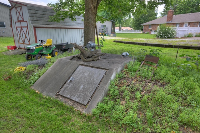2148 Carrie St, Carthage, MO 64836 - view of storm shelter with an outbuilding