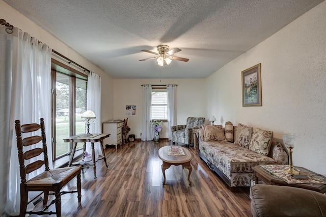 2148 Carrie St, Carthage, MO 64836 - living area featuring ceiling fan, a textured ceiling, and wood finished floors