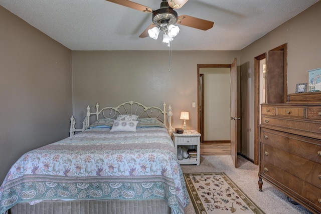 2148 Carrie St, Carthage, MO 64836 - bedroom featuring light colored carpet and a ceiling fan