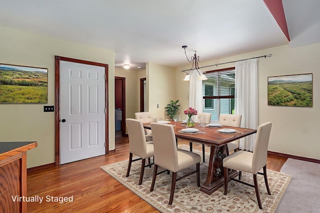 14521 Lawrence Unit 2145, Mount Vernon, MO 65712 - dining room with light wood-type flooring and baseboards