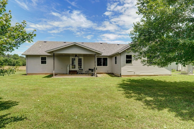 14521 Lawrence Unit 2145, Mount Vernon, MO 65712 - back of house with ceiling fan, a patio, and a lawn