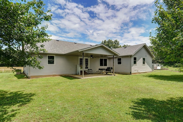 14521 Lawrence Unit 2145, Mount Vernon, MO 65712 - rear view of property featuring a ceiling fan, a lawn, a patio area, and roof with shingles