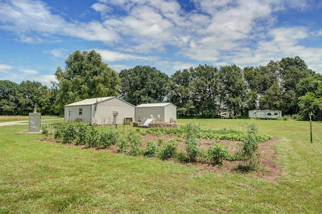 14521 Lawrence Unit 2145, Mount Vernon, MO 65712 - view of green lawn with a shed and view of wooded area
