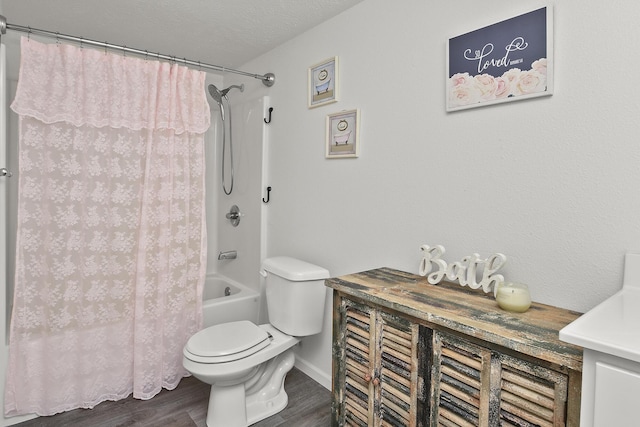 237 Kelsi Ln, Branson, MO 65616 - bathroom featuring wood finished floors, shower / tub combo with curtain, and vanity