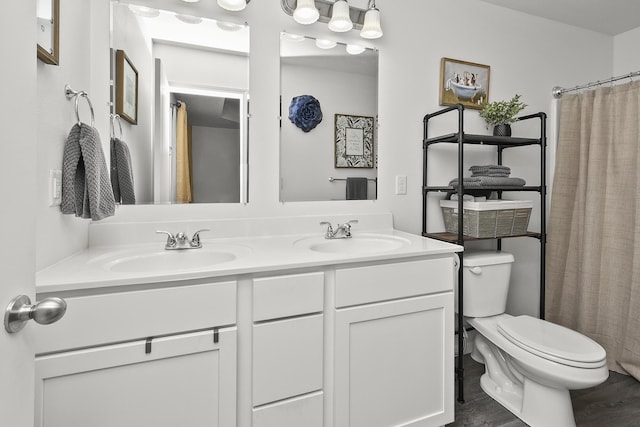 237 Kelsi Ln, Branson, MO 65616 - bathroom featuring double vanity, a shower with curtain, and wood finished floors