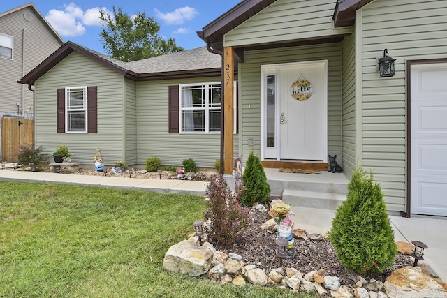 237 Kelsi Ln, Branson, MO 65616 - property entrance featuring roof with shingles and an attached garage