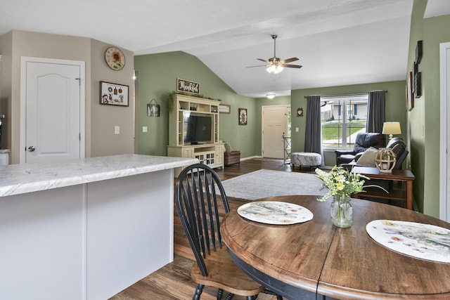 237 Kelsi Ln, Branson, MO 65616 - dining room featuring vaulted ceiling, dark wood-type flooring, and a ceiling fan