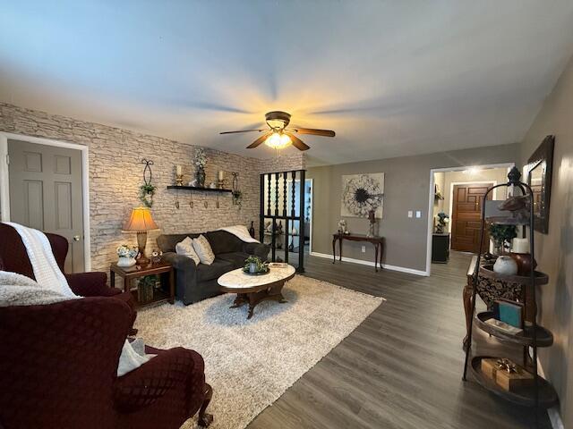212 W Lindberg St, Springfield, MO 65807 - living room featuring ceiling fan and dark wood finished floors