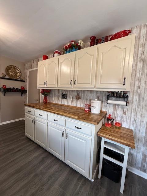 212 W Lindberg St, Springfield, MO 65807 - kitchen with wood counters, white cabinets, dark wood-style floors, and wood walls