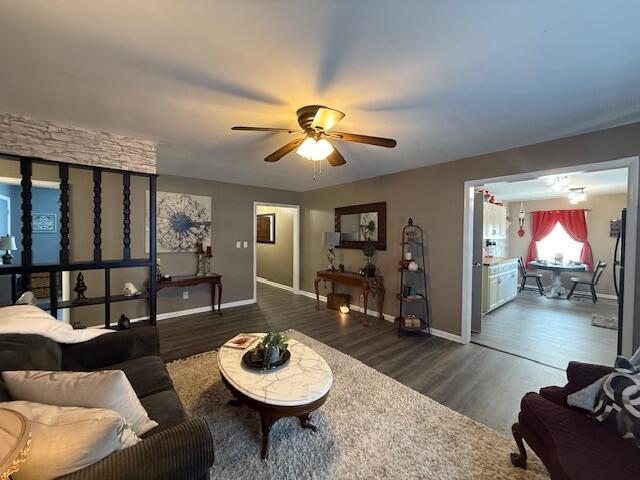 212 W Lindberg St, Springfield, MO 65807 - living area with a ceiling fan and wood finished floors