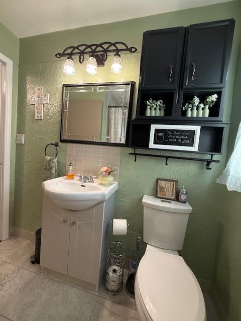212 W Lindberg St, Springfield, MO 65807 - full bath with vanity and tile patterned floors