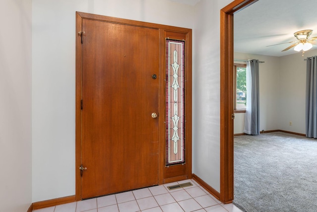 6 Maple Ct, Branson, MO 65616 - entrance foyer with ceiling fan and light colored carpet