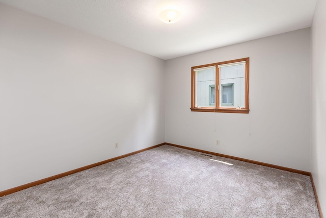 6 Maple Ct, Branson, MO 65616 - carpeted empty room featuring baseboards