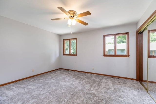 6 Maple Ct, Branson, MO 65616 - empty room with carpet floors, healthy amount of natural light, and a ceiling fan