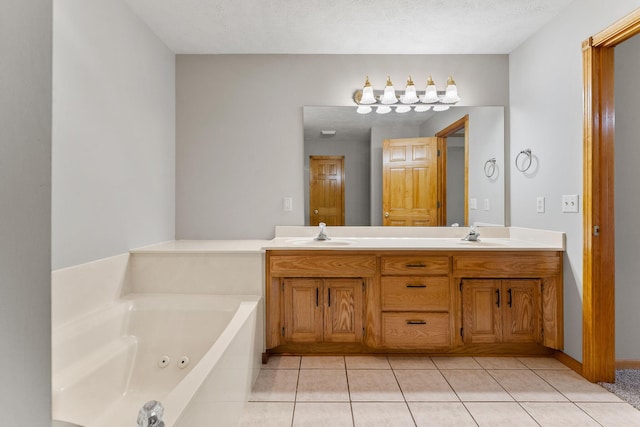 2155 W Vincent St, Springfield, MO 65810 - bathroom featuring double vanity, a jetted tub, and tile patterned floors