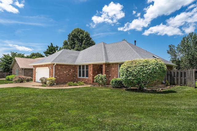 2155 W Vincent St, Springfield, MO 65810 - view of front of house with concrete driveway, a garage, brick siding, and roof with shingles