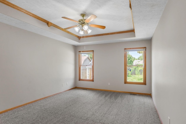 2155 W Vincent St, Springfield, MO 65810 - empty room featuring crown molding, plenty of natural light, carpet floors, a ceiling fan, and a textured ceiling