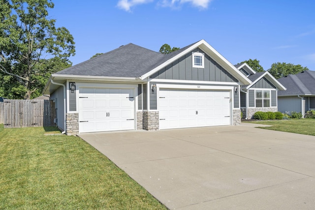 724 N Vermillion Dr, Strafford, MO 65757 - view of front of property with stone siding, an attached garage, concrete driveway, and board and batten siding