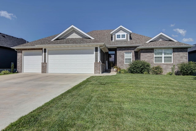 677 N Fox Hill Cir, Nixa, MO 65714 - view of front facade featuring a garage, concrete driveway, brick siding, a front lawn, and a shingled roof
