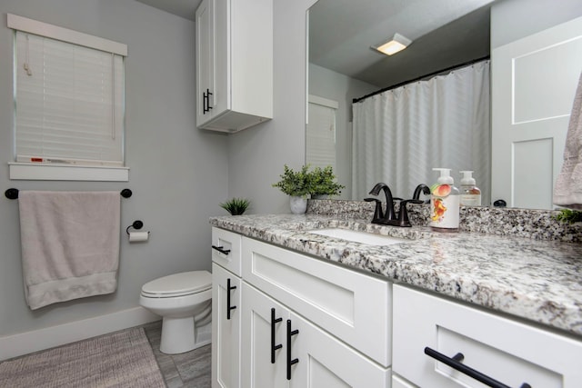 677 N Fox Hill Cir, Nixa, MO 65714 - full bathroom with vanity and baseboards