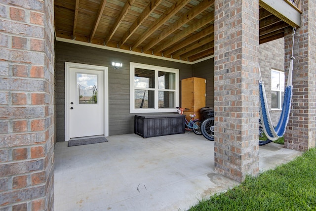 677 N Fox Hill Cir, Nixa, MO 65714 - entrance to property with a patio area