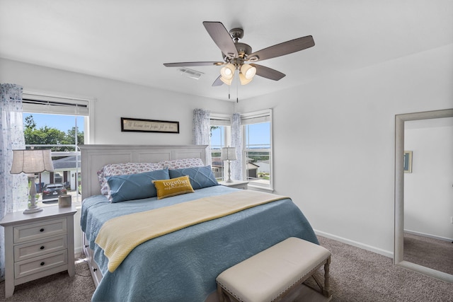 135 Pin Oak Ct, Hollister, MO 65672 - bedroom featuring dark colored carpet and ceiling fan