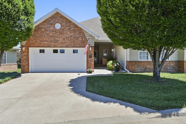 1376 N Sandy Creek Cir # 1, Nixa, MO 65714 - view of front of property featuring brick siding, a garage, driveway, a front yard, and roof with shingles