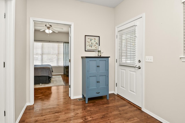 1376 N Sandy Creek Cir # 1, Nixa, MO 65714 - foyer entrance with dark wood-type flooring and ceiling fan