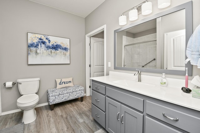 1376 N Sandy Creek Cir # 1, Nixa, MO 65714 - bathroom featuring wood finished floors, vanity, and tiled shower