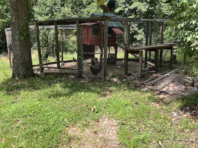 1103 Riverview Dr, Mammoth Spring, AR 72554 - view of jungle gym featuring exterior structure and an outbuilding