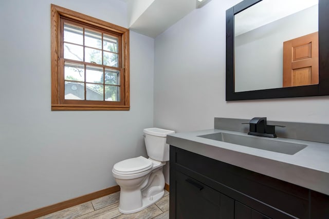 2210 S Catalina Ave, Springfield, MO 65804 - bathroom with vanity and wood finished floors