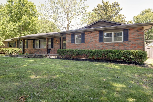 2210 S Catalina Ave, Springfield, MO 65804 - ranch-style house with brick siding and a front yard