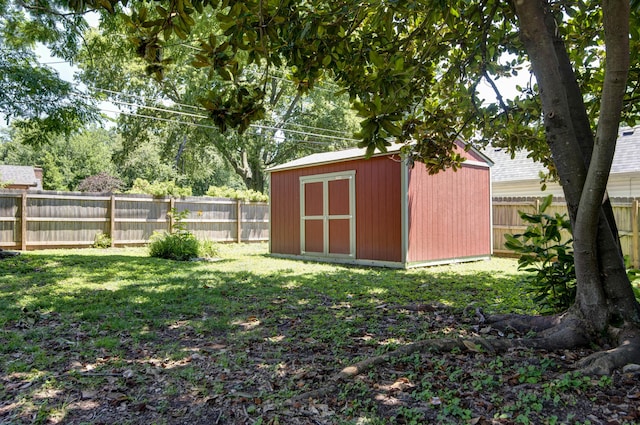 2210 S Catalina Ave, Springfield, MO 65804 - fenced backyard with a storage unit