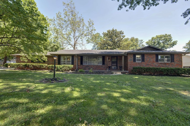 2210 S Catalina Ave, Springfield, MO 65804 - single story home featuring brick siding and a front lawn