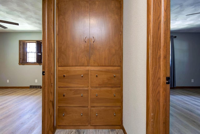 2210 S Catalina Ave, Springfield, MO 65804 - detailed view of wood finished floors and ceiling fan